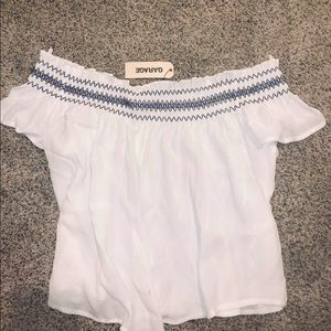 Garage, over the shoulder shirt.